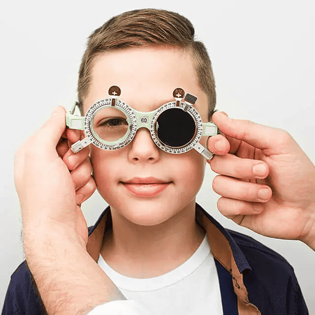 A boy receiving an eye exam at a Dynamic Vision Optometrist