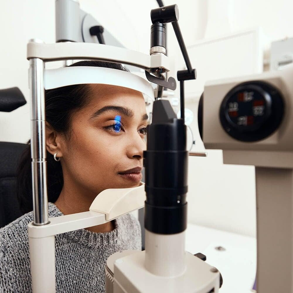 A Dynamic Vision optometrist patient undergoing a comprehensive eye exam