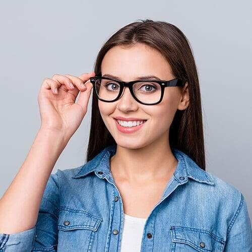 A Dynamic Vision client with her pair of superior quality spectacle frames