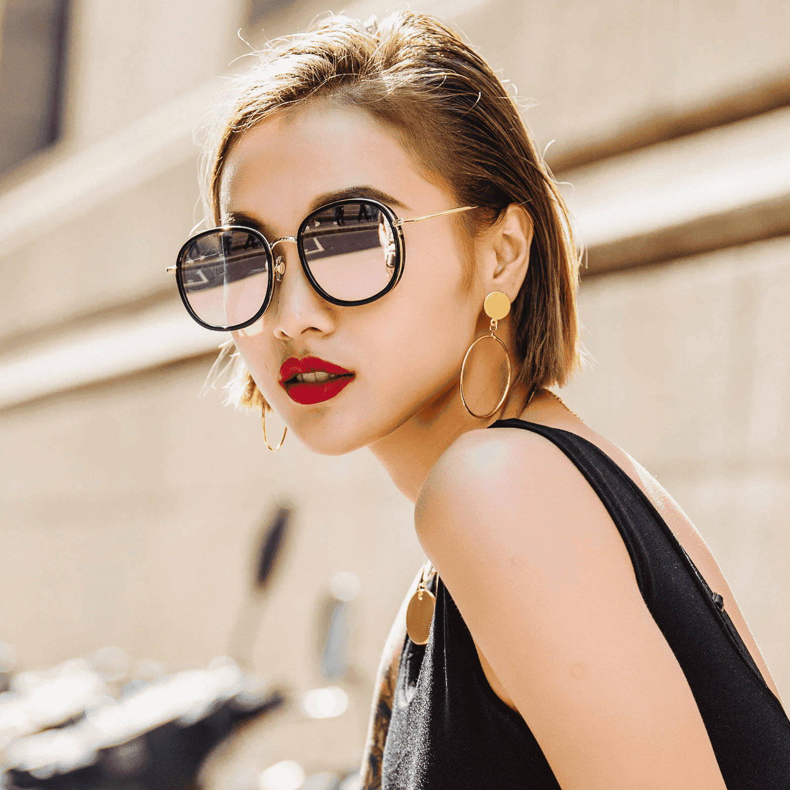 A pair of fashionable polarised prescription sunglasses worn by a lady