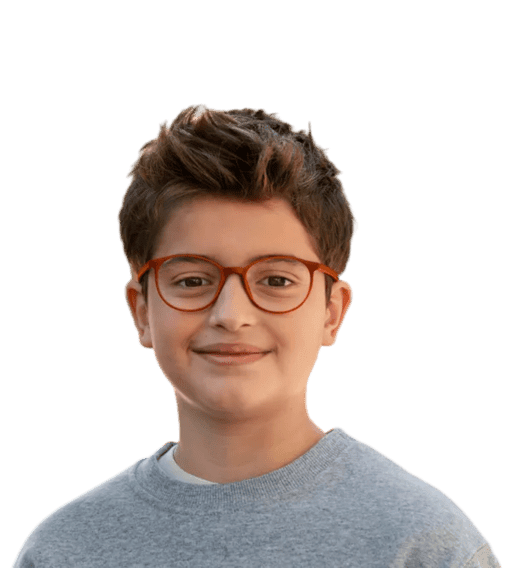 Smiling child wearing glasses after myopia diagnosis