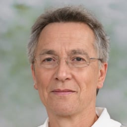 Older man wearing prescription glasses, demonstrating clear vision and comfortable eyewear.