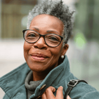 A satisfied Dynamic Vision customer wearing her new prescription lenses