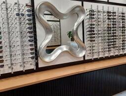 Spectacle display with mirror in the centre at Dynamic Vision Bedfordview store.