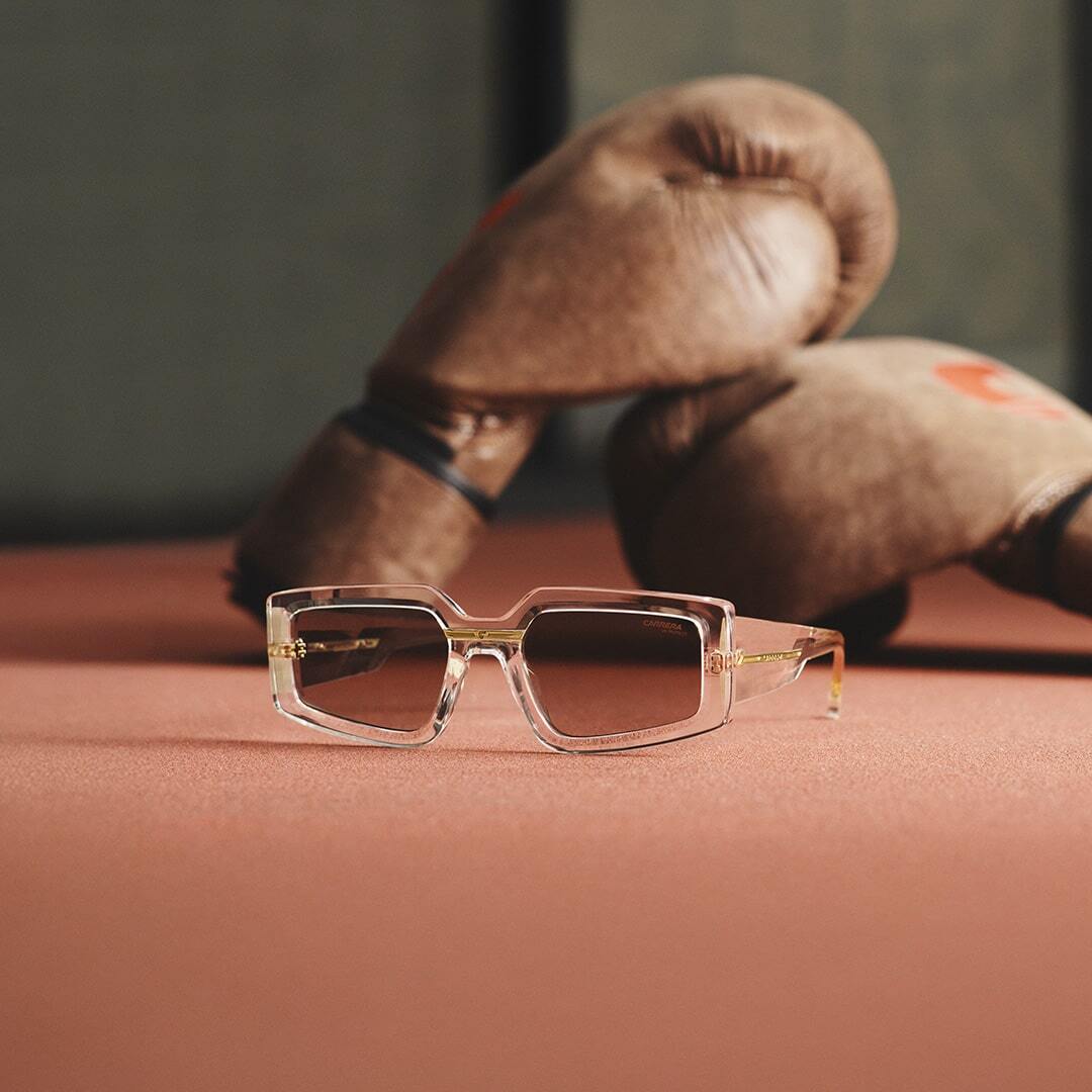 Close-up image of Carrera sunglasses showing classic frame design and finish.